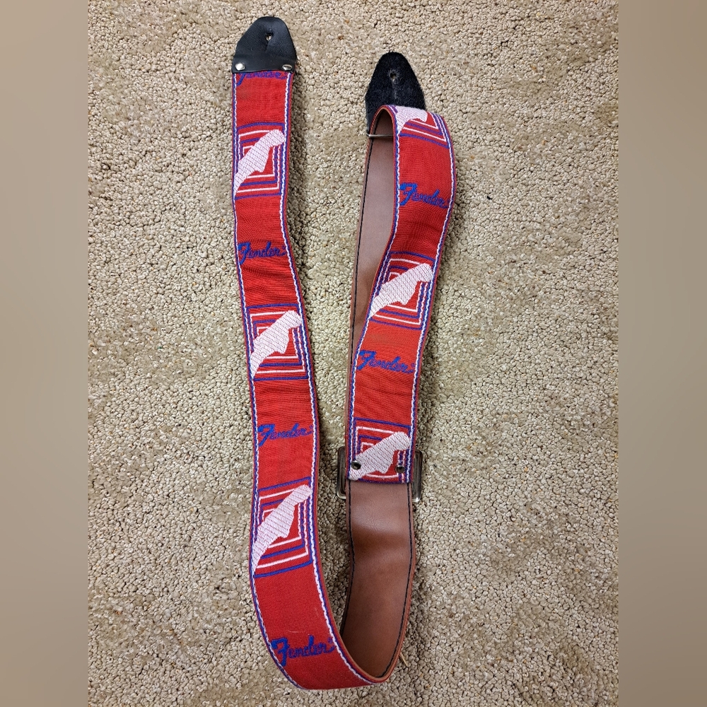 Vintage Fender Vibrant Red Guitar Strap with Blue and White Accents